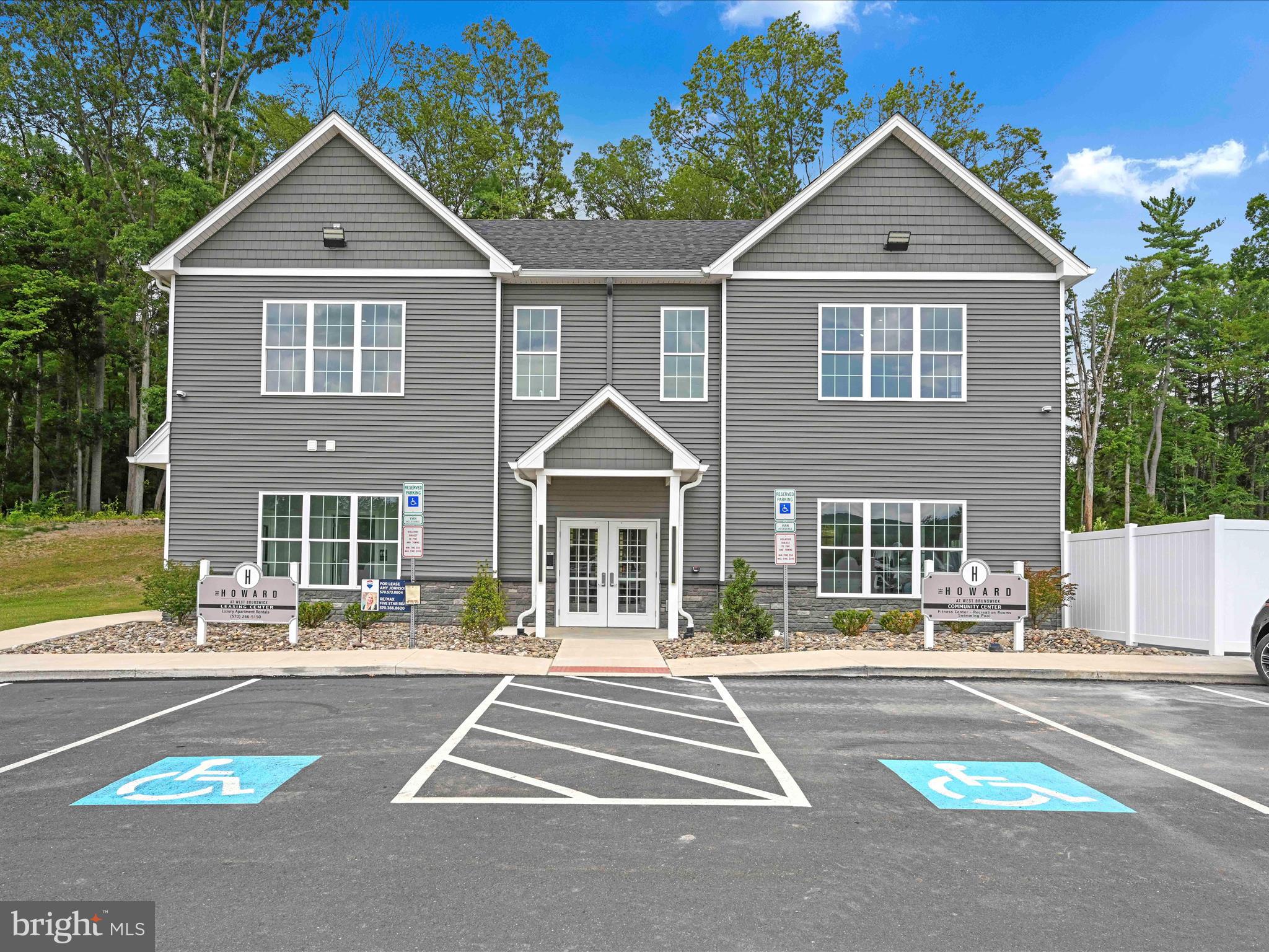500-800 Paramount Boulevard, Unit 101312 Orwigsburg, PA 17961 - Photo 39 of 66 a front view of a house with a yard