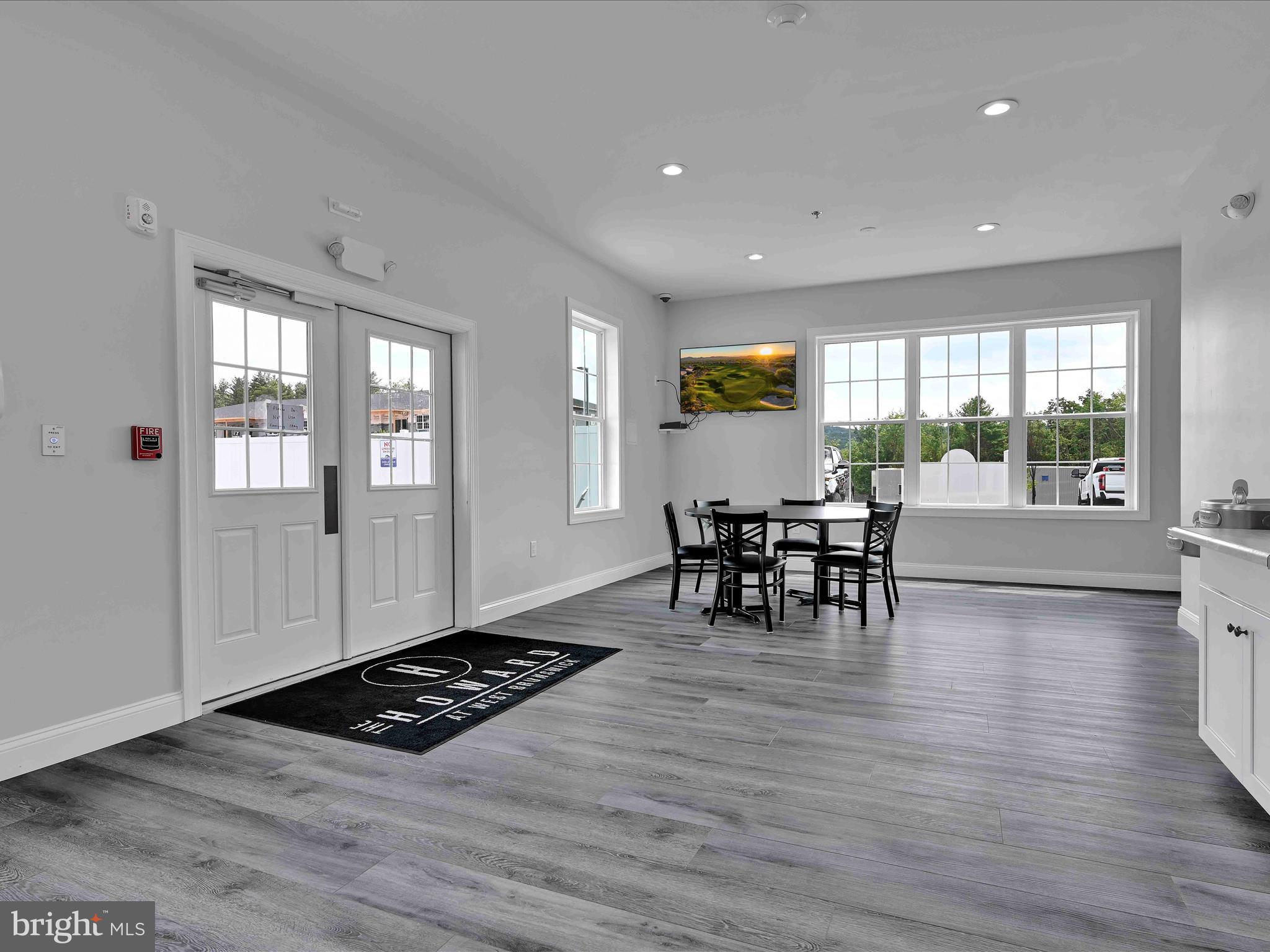 500-800 Paramount Boulevard, Unit 101312 Orwigsburg, PA 17961 - Photo 49 of 66 a view of a dining room with furniture and wooden floor