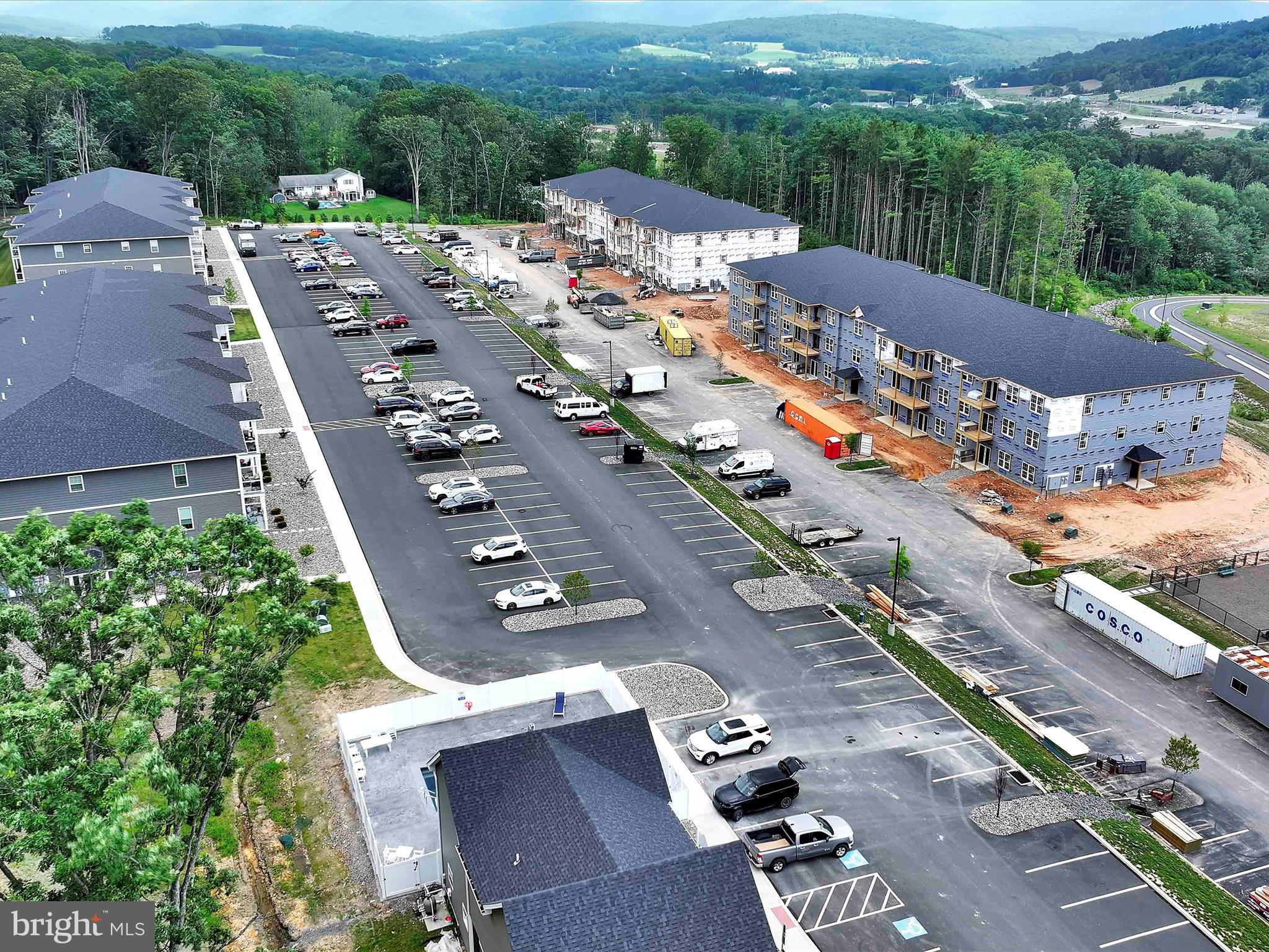 500-800 Paramount Boulevard, Unit 101312 Orwigsburg, PA 17961 - Photo 6 of 66 an aerial view of a city with lots of residential buildings