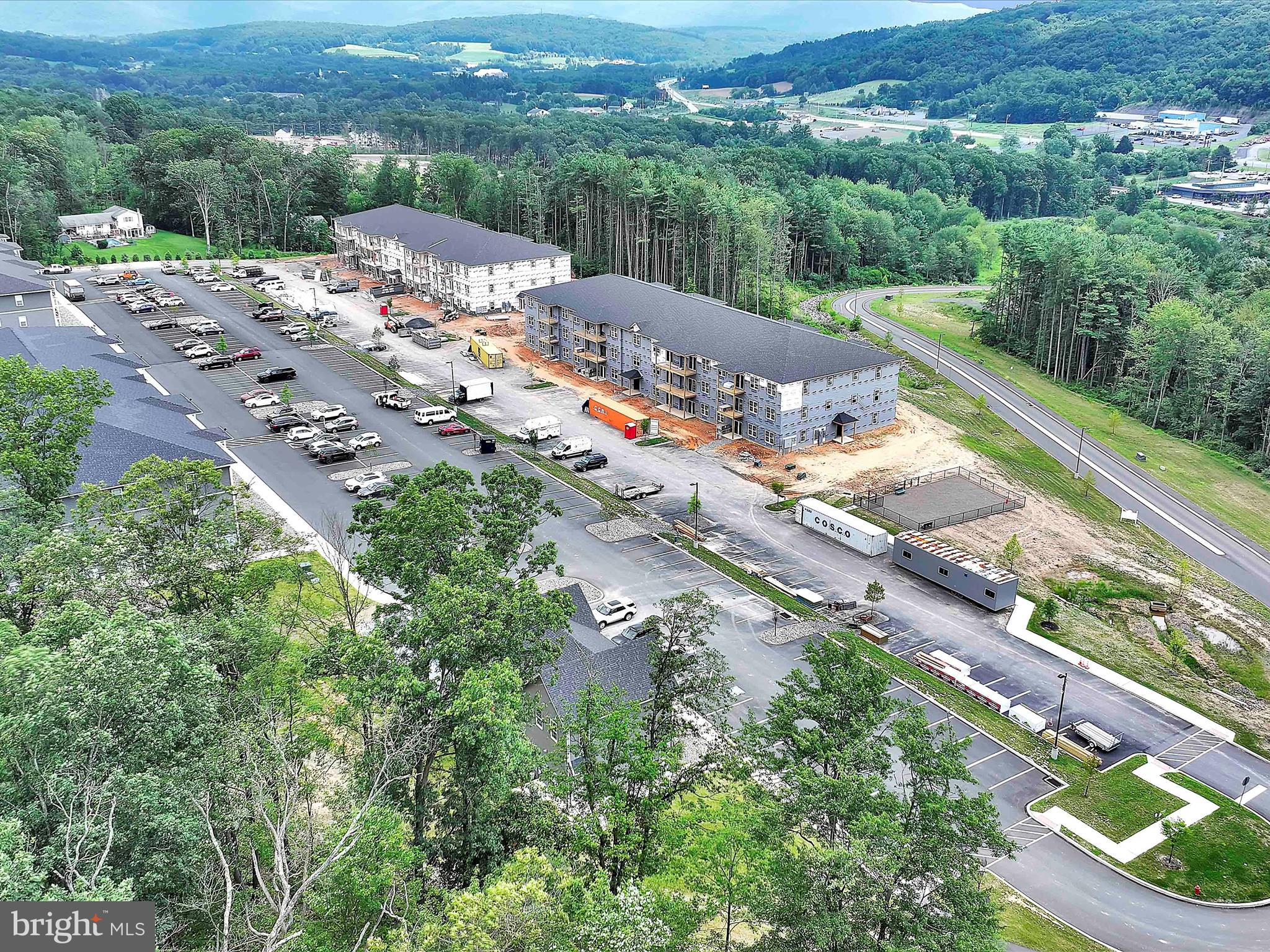 500-800 Paramount Boulevard, Unit 101312 Orwigsburg, PA 17961 - Photo 7 of 66 an aerial view of multiple house