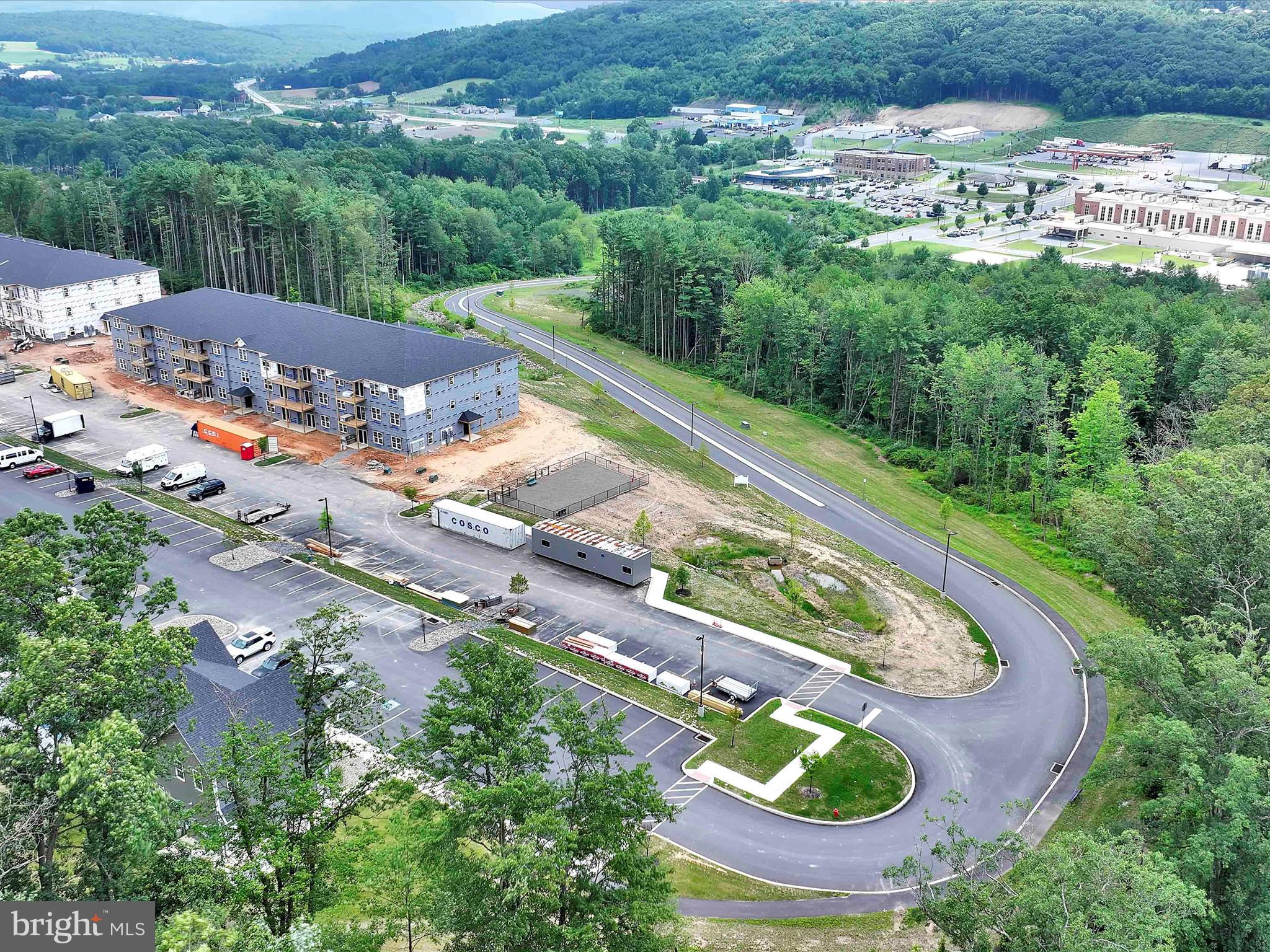 500-800 Paramount Boulevard, Unit 101312 Orwigsburg, PA 17961 - Photo 8 of 66 an aerial view of residential house with outdoor space and street view