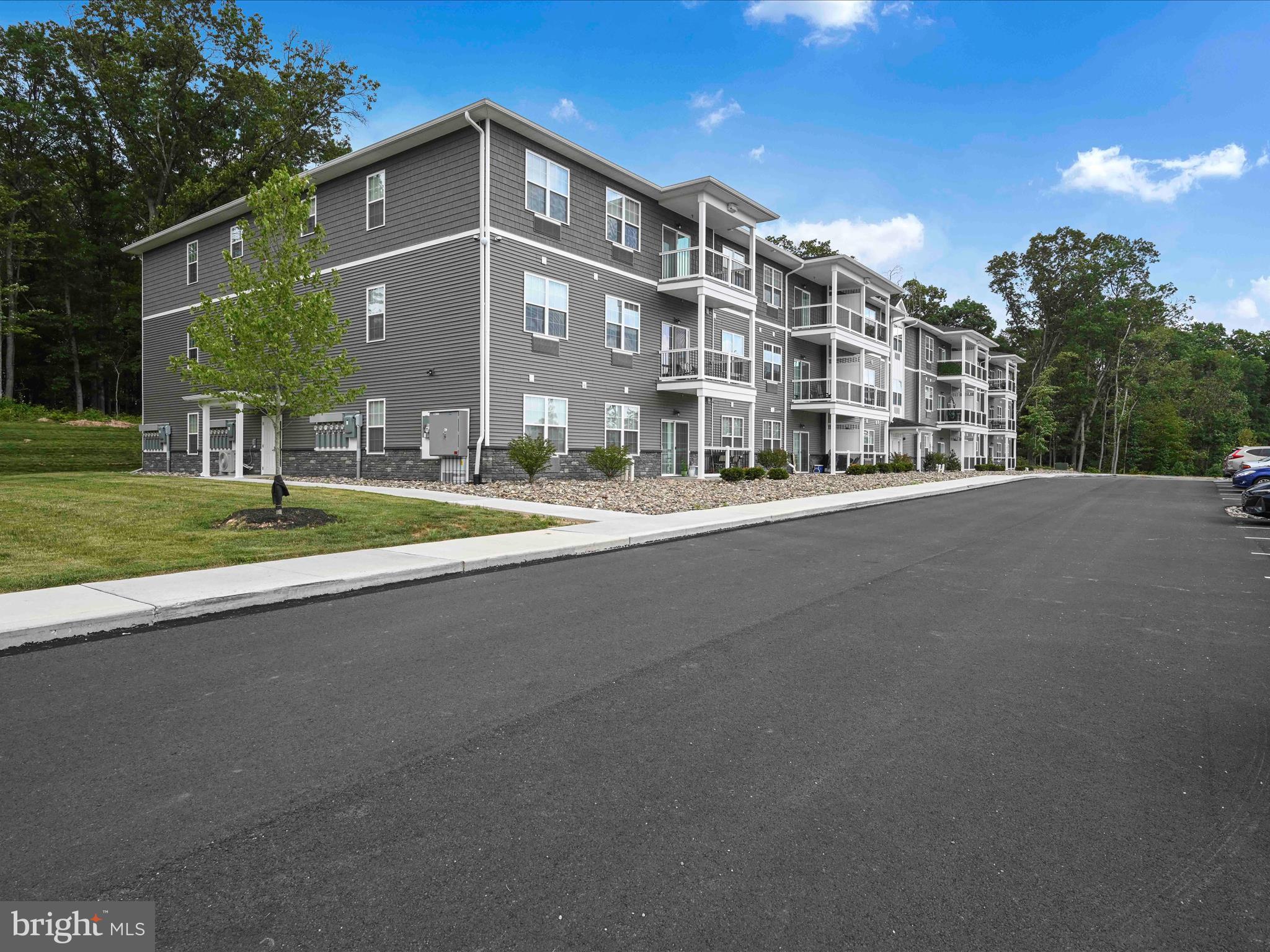 500-800 Paramount Boulevard, Unit 101312 Orwigsburg, PA 17961 - Photo 9 of 66 a view of a building with a street