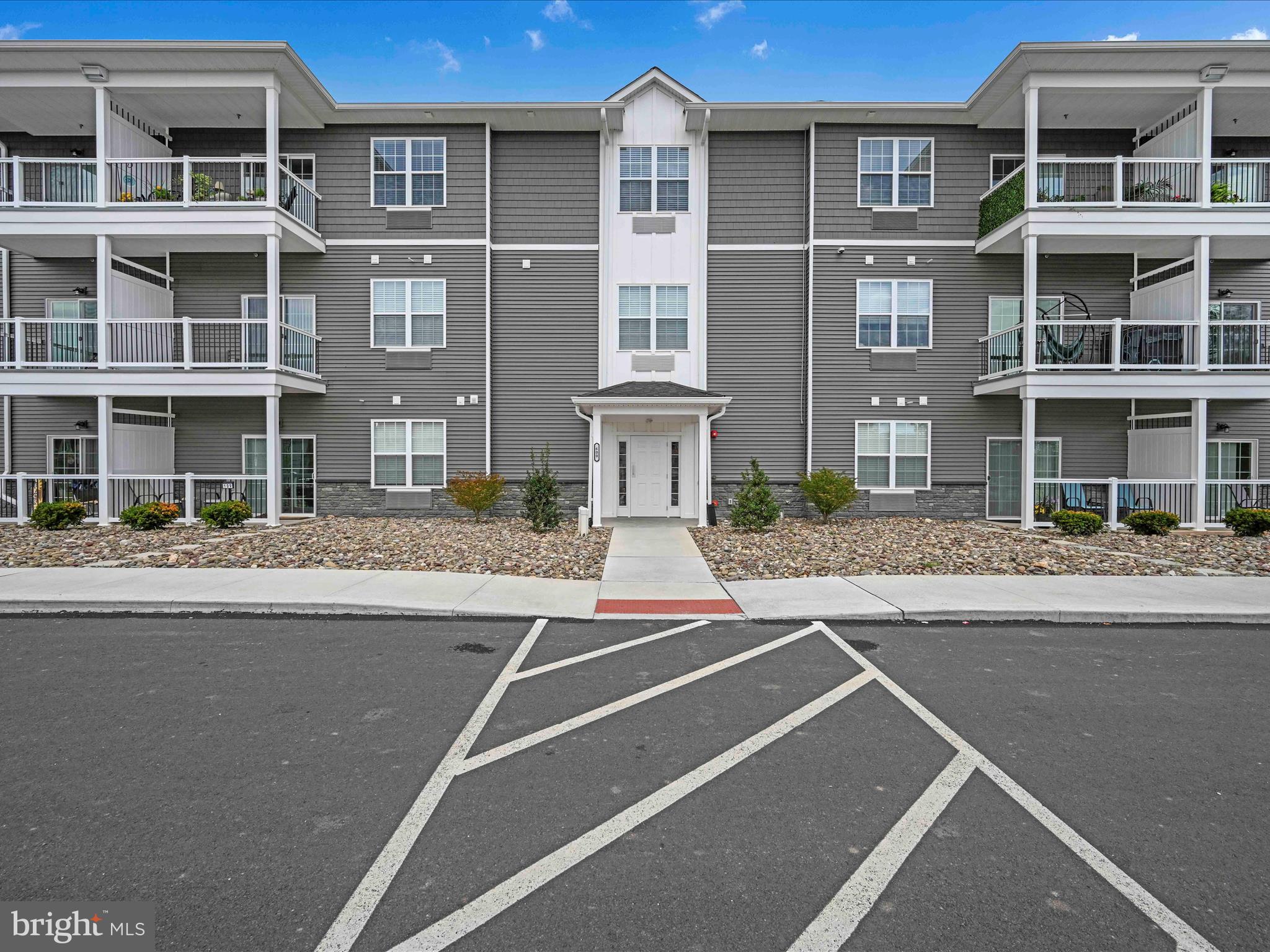 500-800 Paramount Boulevard, Unit 101312 Orwigsburg, PA 17961 - Photo 10 of 66 a front view of a building with a street