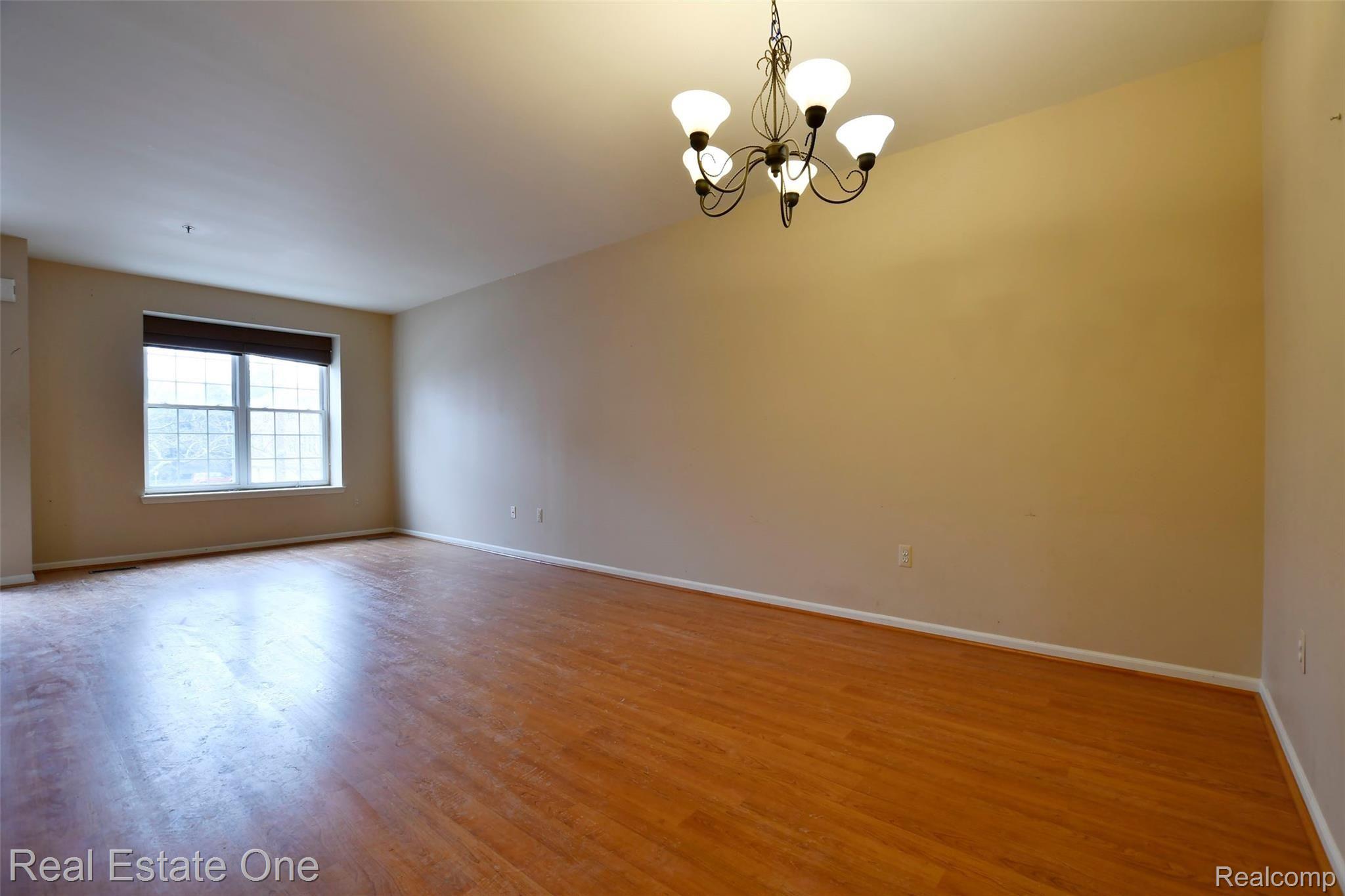 20281 Rodeo Court Southfield, MI 48075 - Photo 2 of 13 Living room and Dining.jpg
