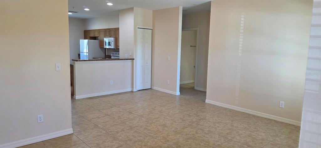 26172 Explorer Road, Unit 4 Punta Gorda, FL 33983 - Photo 2 of 11 a view of kitchen and windows