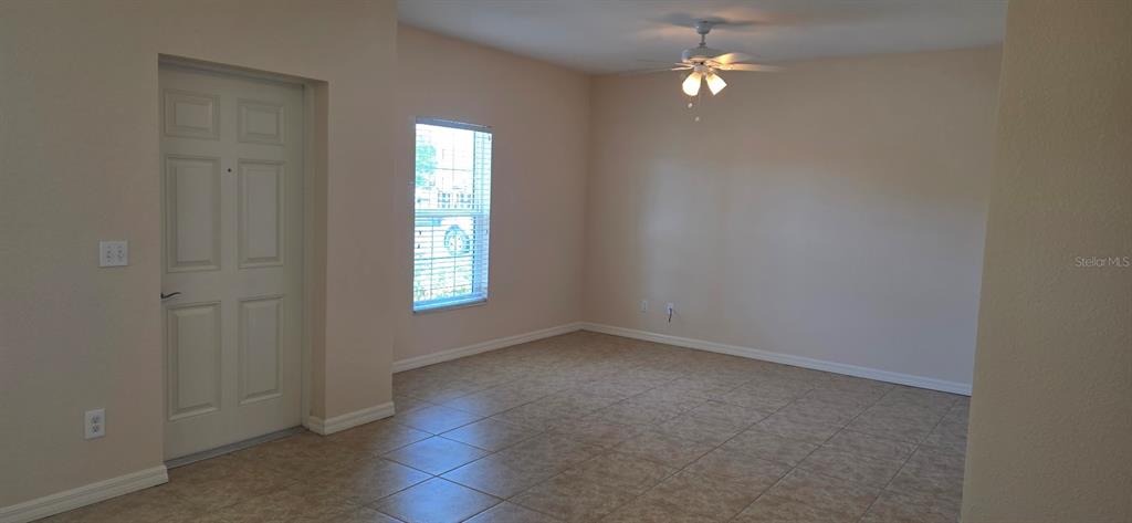 26172 Explorer Road, Unit 4 Punta Gorda, FL 33983 - Photo 3 of 11 an empty room that has a window in it