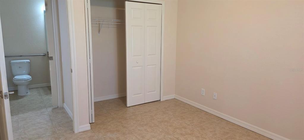 26172 Explorer Road, Unit 4 Punta Gorda, FL 33983 - Photo 7 of 11 a view of a bathroom from a bathroom