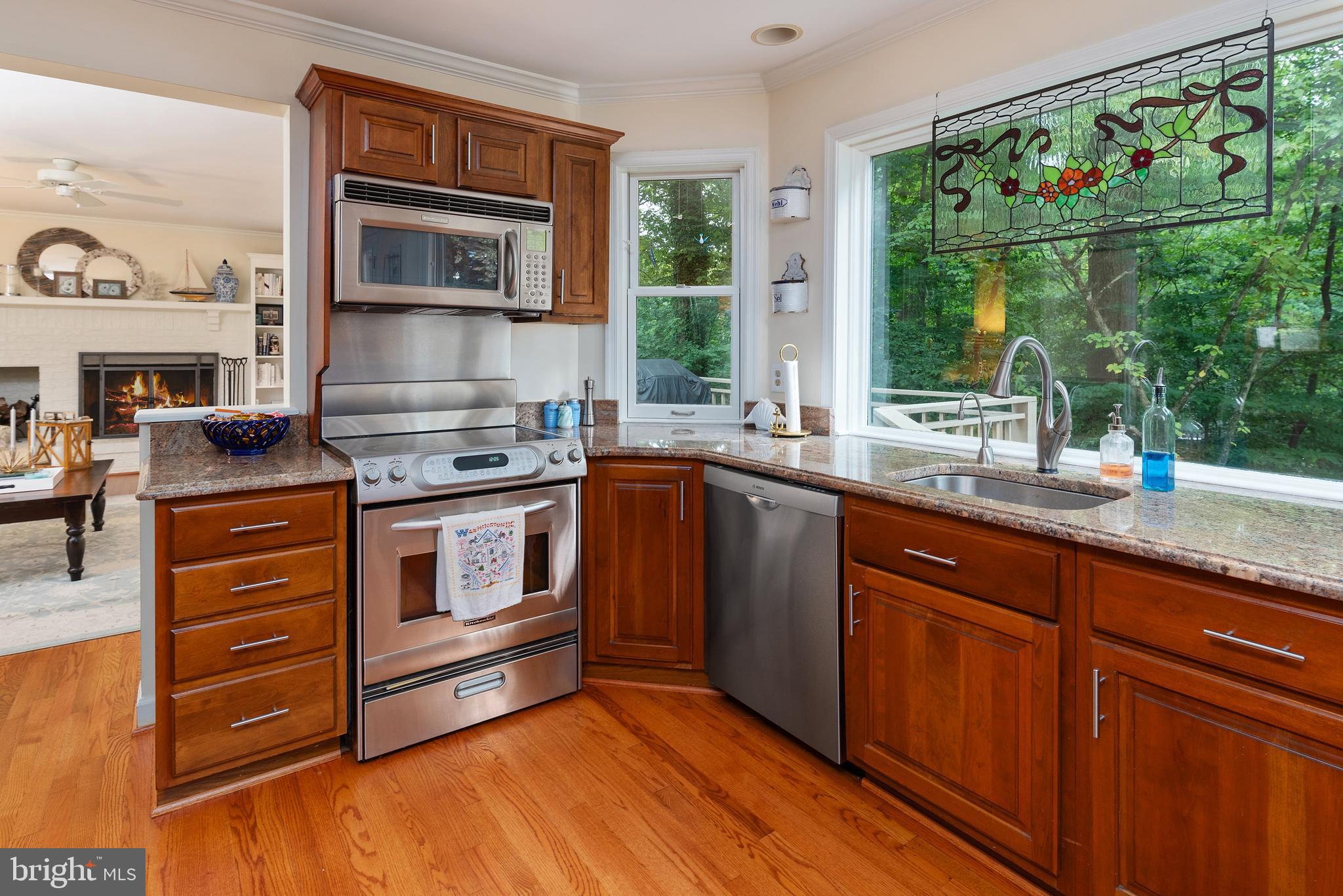 1936 High Ridge Road Annapolis, MD 21409 - Photo 13 of 75 Wall of windows make kitchen prep pleasing.