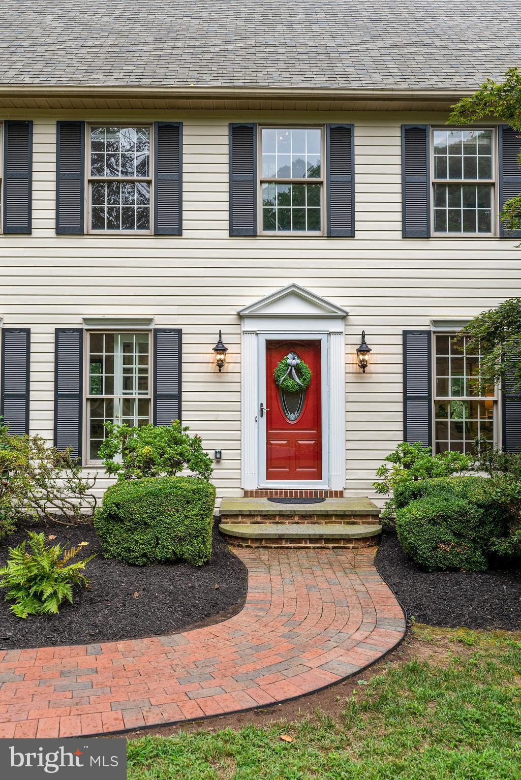 1936 High Ridge Road Annapolis, MD 21409 - Photo 42 of 75 Curved brick walkway meanders to front door.