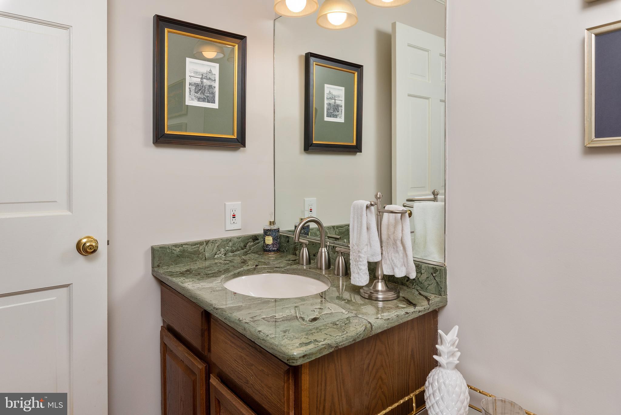 1936 High Ridge Road Annapolis, MD 21409 - Photo 6 of 75 Main level powder room features granite vanity.