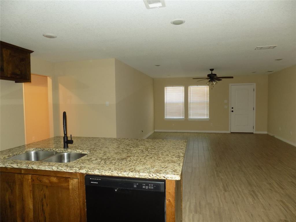 506 Pecan Tree Court Poolville, TX 76487 - Photo 18 of 36 New dishwasher at island location