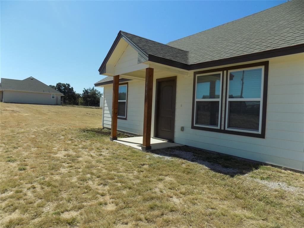 506 Pecan Tree Court Poolville, TX 76487 - Photo 2 of 36 Covered front porch