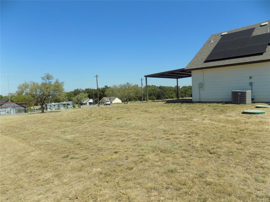 506 Pecan Tree Court Poolville, TX 76487 - Photo 34 of 36 Large back yard