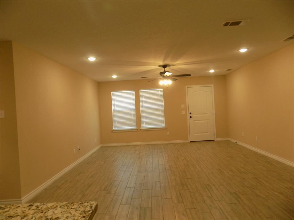 506 Pecan Tree Court Poolville, TX 76487 - Photo 4 of 36 Lovely open living area, light and bright
