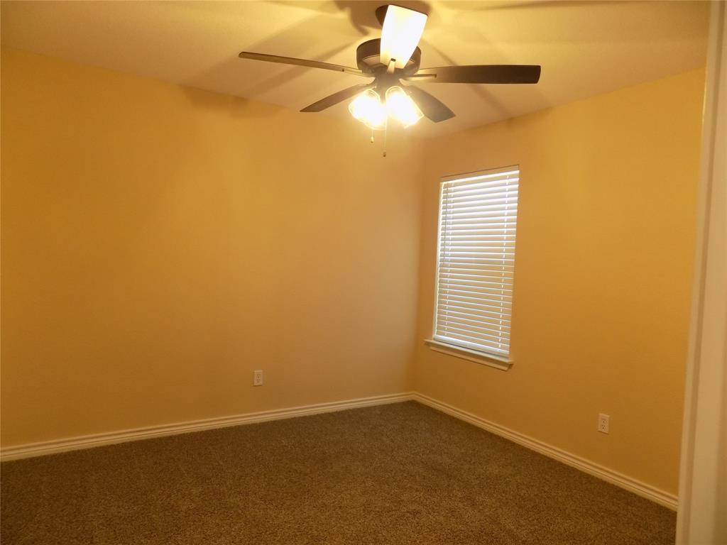 506 Pecan Tree Court Poolville, TX 76487 - Photo 8 of 36 Secondary bedroom