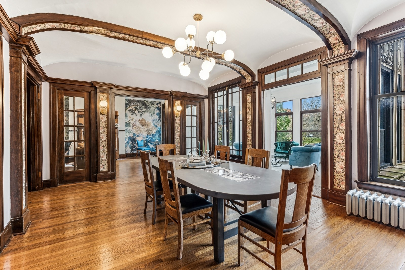 851 East Drexel Square, Unit 1A Chicago, IL 60615 - Photo 11 of 21 a view of a dining room with furniture window and wooden floor