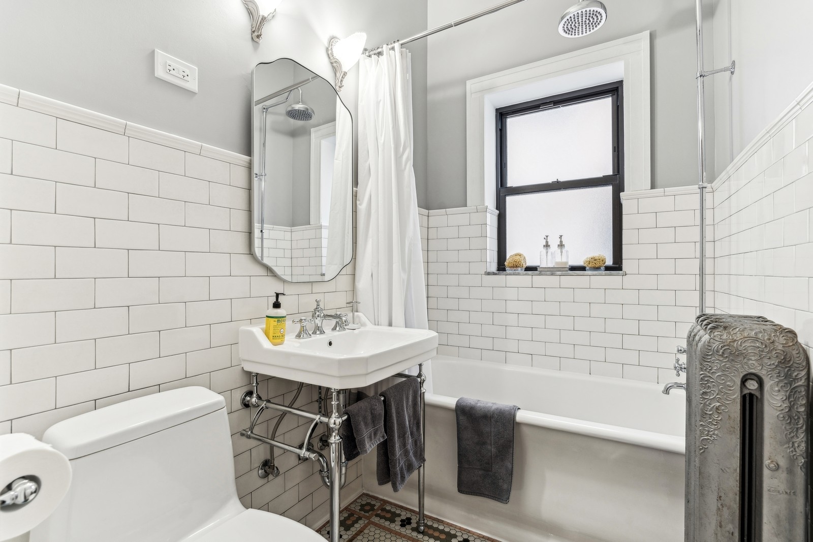 851 East Drexel Square, Unit 1A Chicago, IL 60615 - Photo 19 of 21 a bathroom with a sink a toilet and shower
