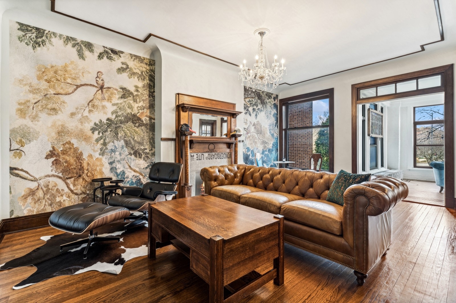 851 East Drexel Square, Unit 1A Chicago, IL 60615 - Photo 3 of 21 a living room with furniture and a chandelier