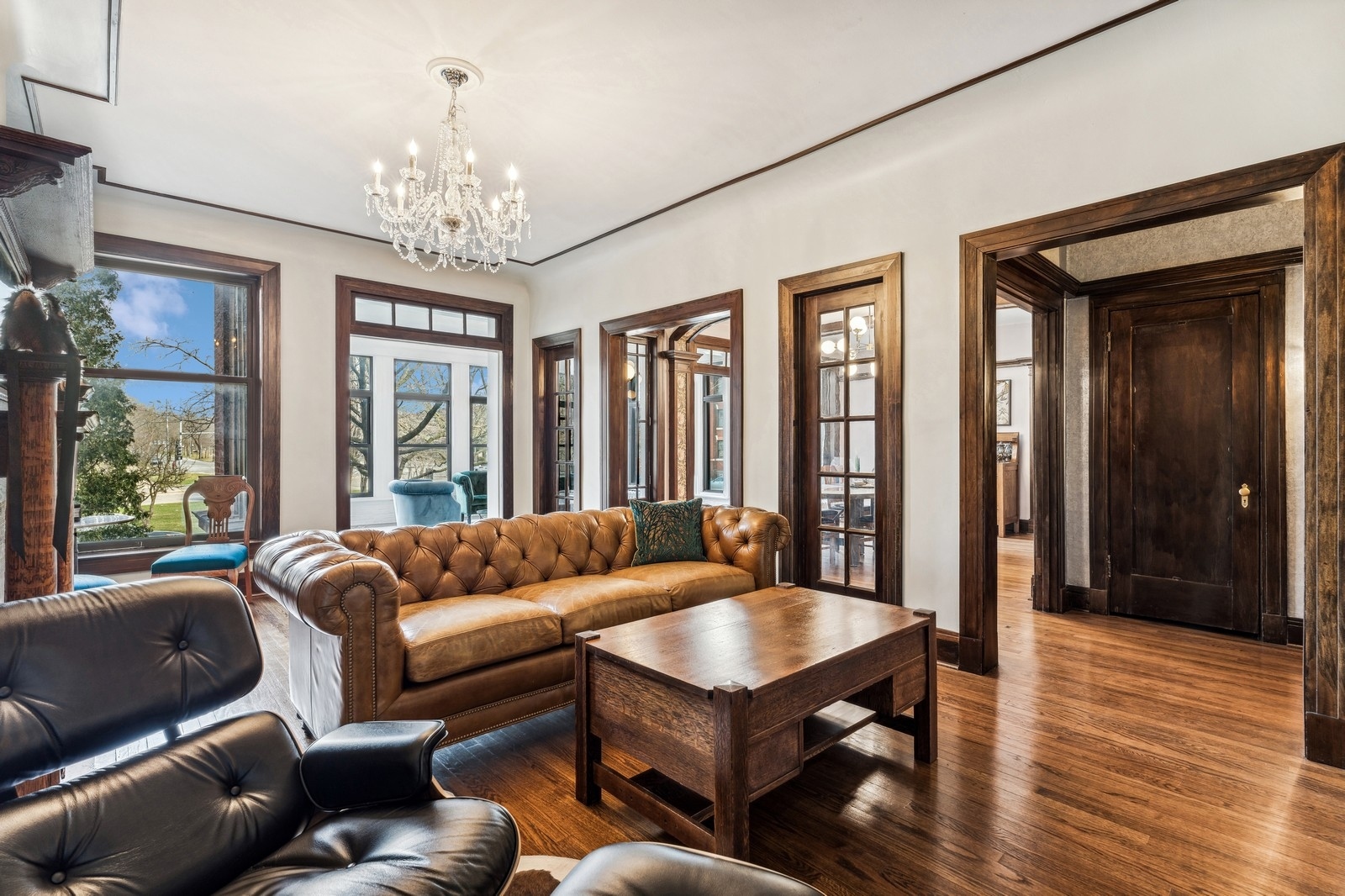 851 East Drexel Square, Unit 1A Chicago, IL 60615 - Photo 4 of 21 a living room with furniture and a chandelier