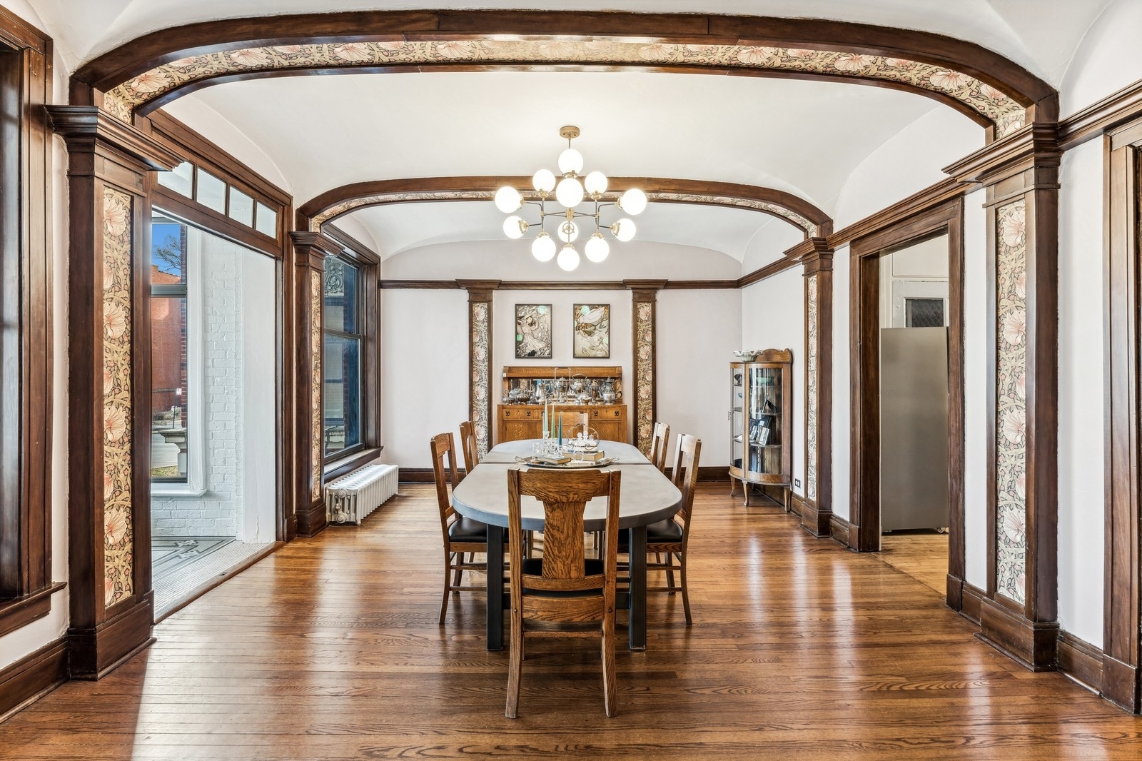 851 East Drexel Square, Unit 1A Chicago, IL 60615 - Photo 9 of 21 a view of a dining room with furniture and wooden floor