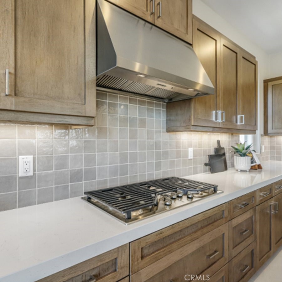 105 Proctor Irvine, CA 92618 - Photo 3 of 33 a stove top oven sitting inside of a kitchen