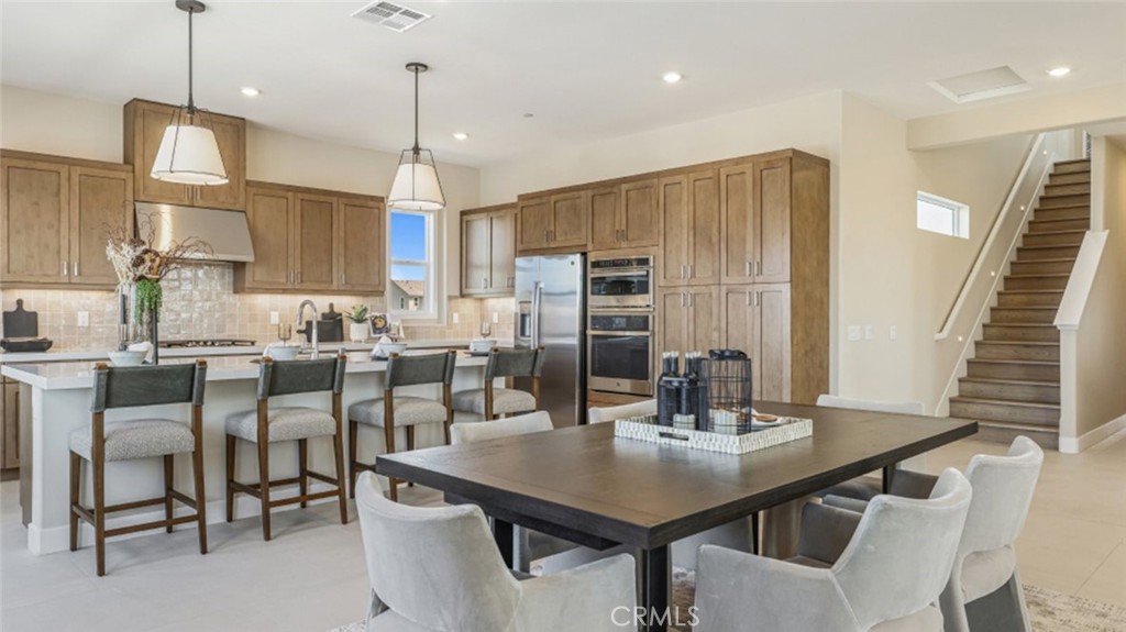 105 Proctor Irvine, CA 92618 - Photo 6 of 33 a view of a dining room with furniture