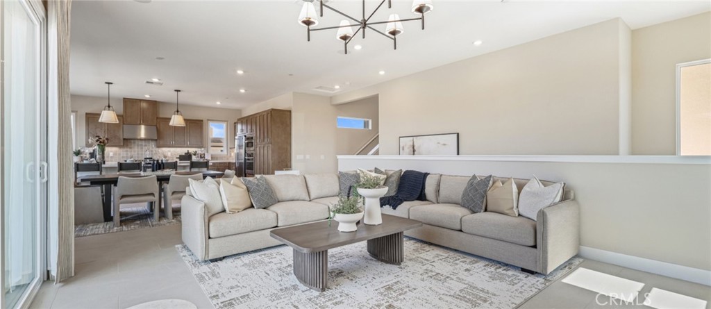 105 Proctor Irvine, CA 92618 - Photo 8 of 33 a living room with furniture and kitchen view
