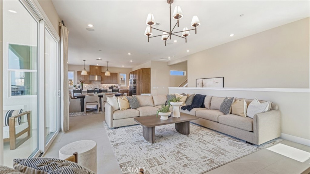 105 Proctor Irvine, CA 92618 - Photo 10 of 33 a living room with furniture and kitchen view