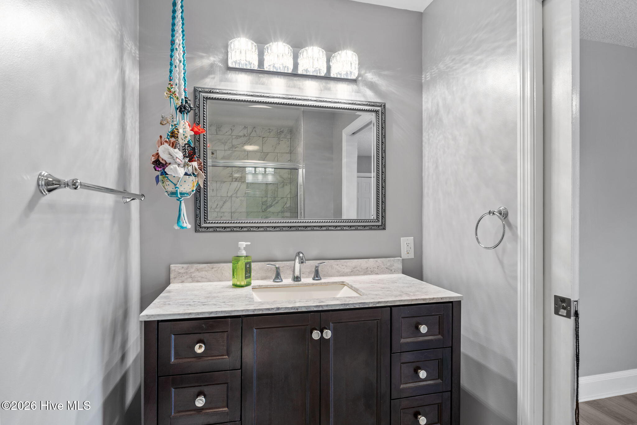 116 Pine Lake Road Cape Carteret, NC 28584 - Photo 34 of 58 Updated lighting, vanity & mirror