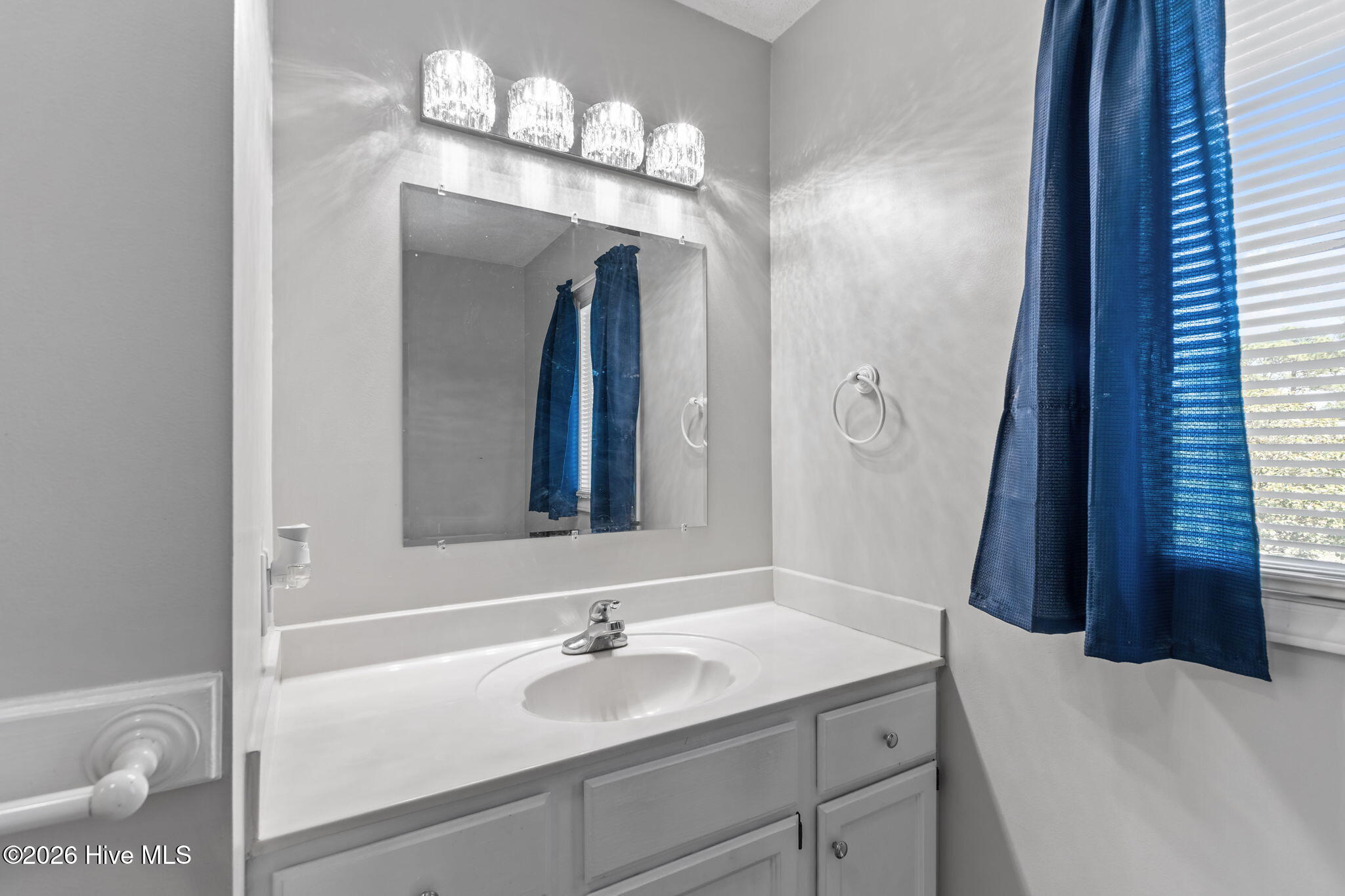 116 Pine Lake Road Cape Carteret, NC 28584 - Photo 41 of 58 Updated lightin g and mirror