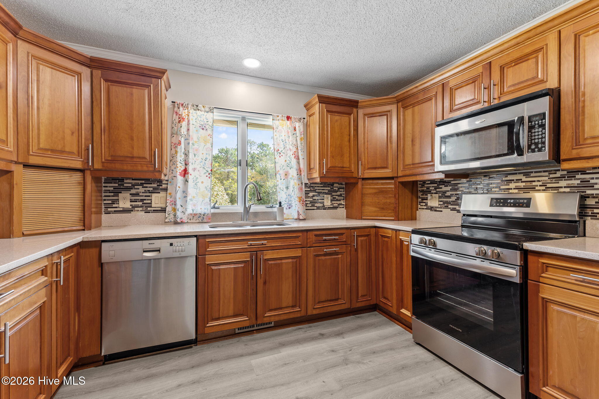 116 Pine Lake Road Cape Carteret, NC 28584 - Photo 45 of 58 Plentiful cabinet space!