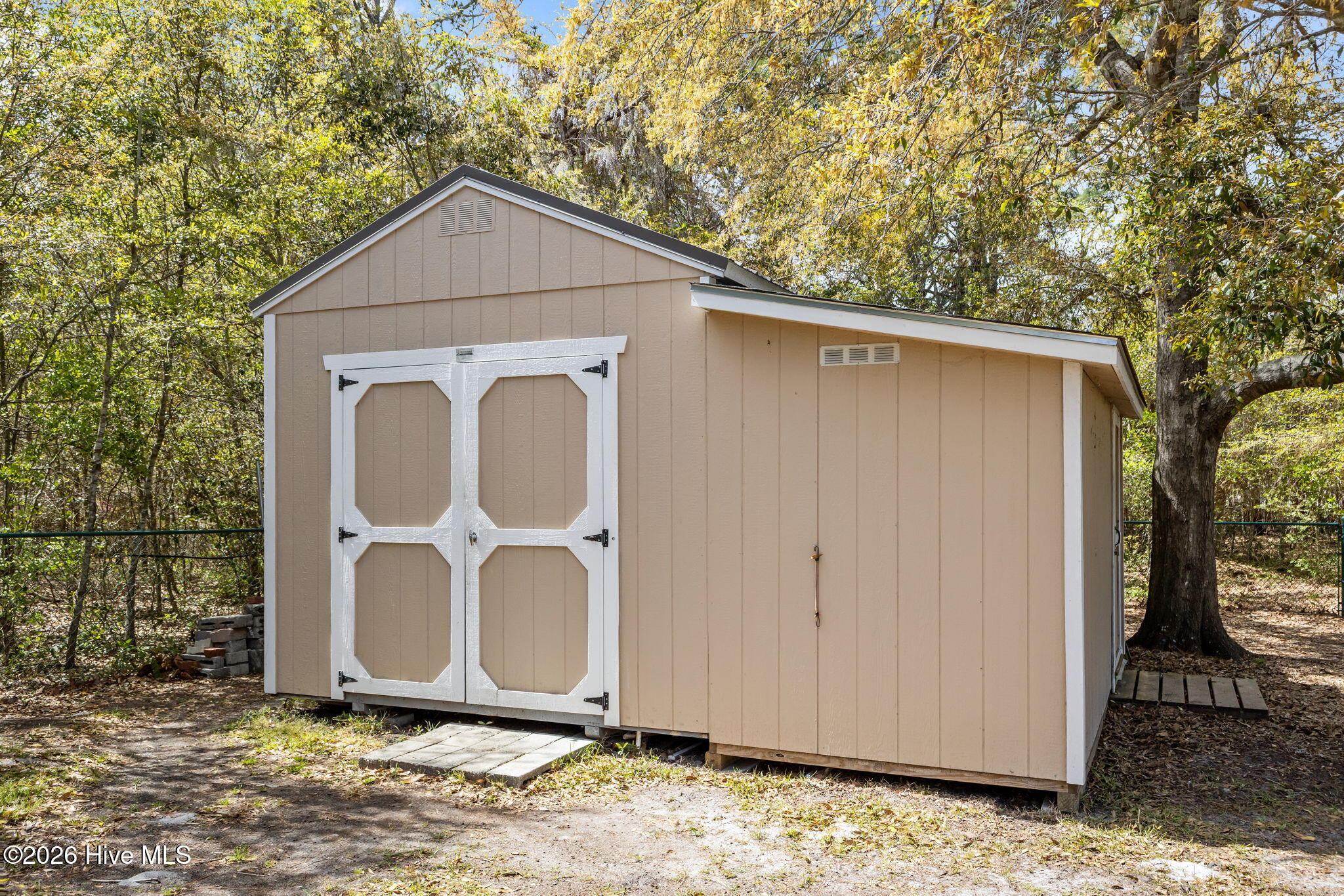 116 Pine Lake Road Cape Carteret, NC 28584 - Photo 51 of 58 Storage Shed in back yard