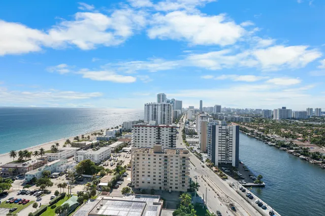 a view of a city with a lake