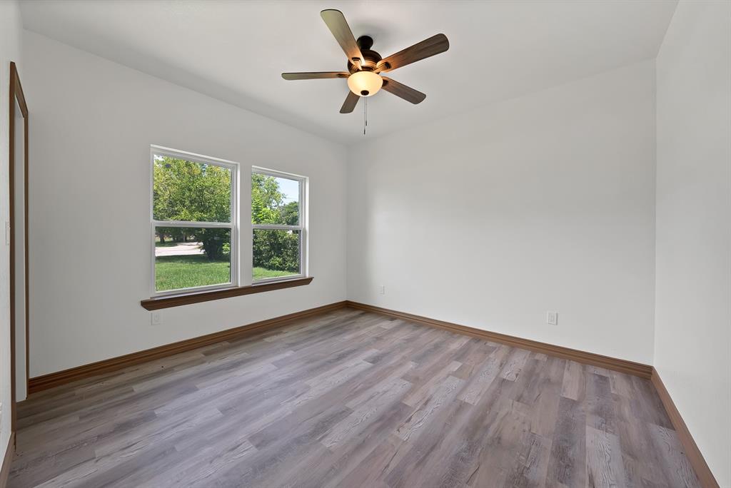 206 Hix Road Cleburne, TX 76031 - Photo 31 of 40 Spare room featuring light wood-style flooring and ceiling fan