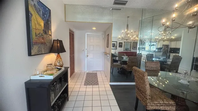 a view of a living room and dining room