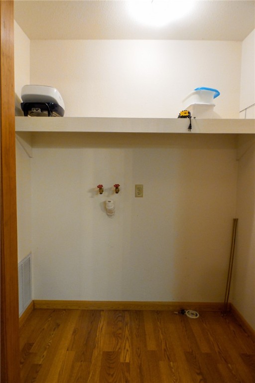 156 Naylor Road Calliham, TX 78007 - Photo 24 of 28 a view of a closet with an empty shelf
