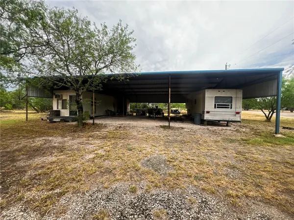 a view of a house with a patio