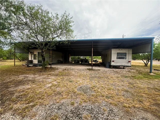 a view of a house with a patio