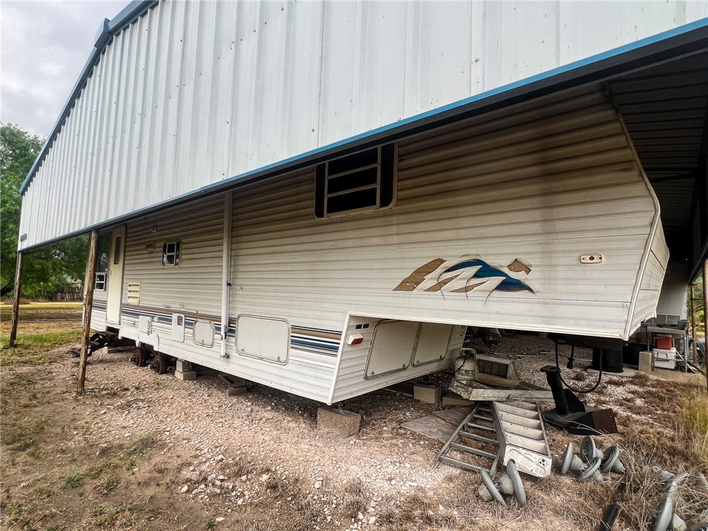 156 Naylor Road Calliham, TX 78007 - Photo 6 of 28 an outdoor view of house with balcony