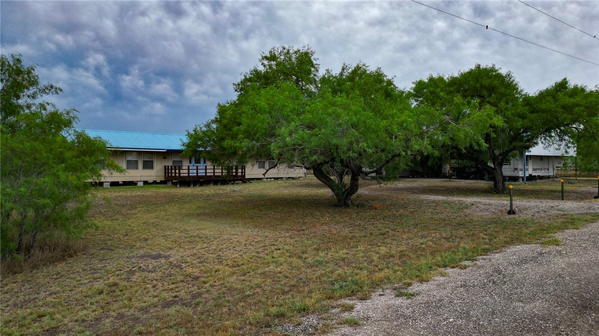 156 Naylor Road Calliham, TX 78007 - Photo 8 of 28 a view of outdoor space with deck and yard