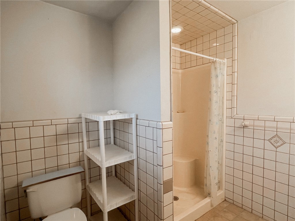 156 Naylor Road Calliham, TX 78007 - Photo 10 of 28 a bathroom with a shower