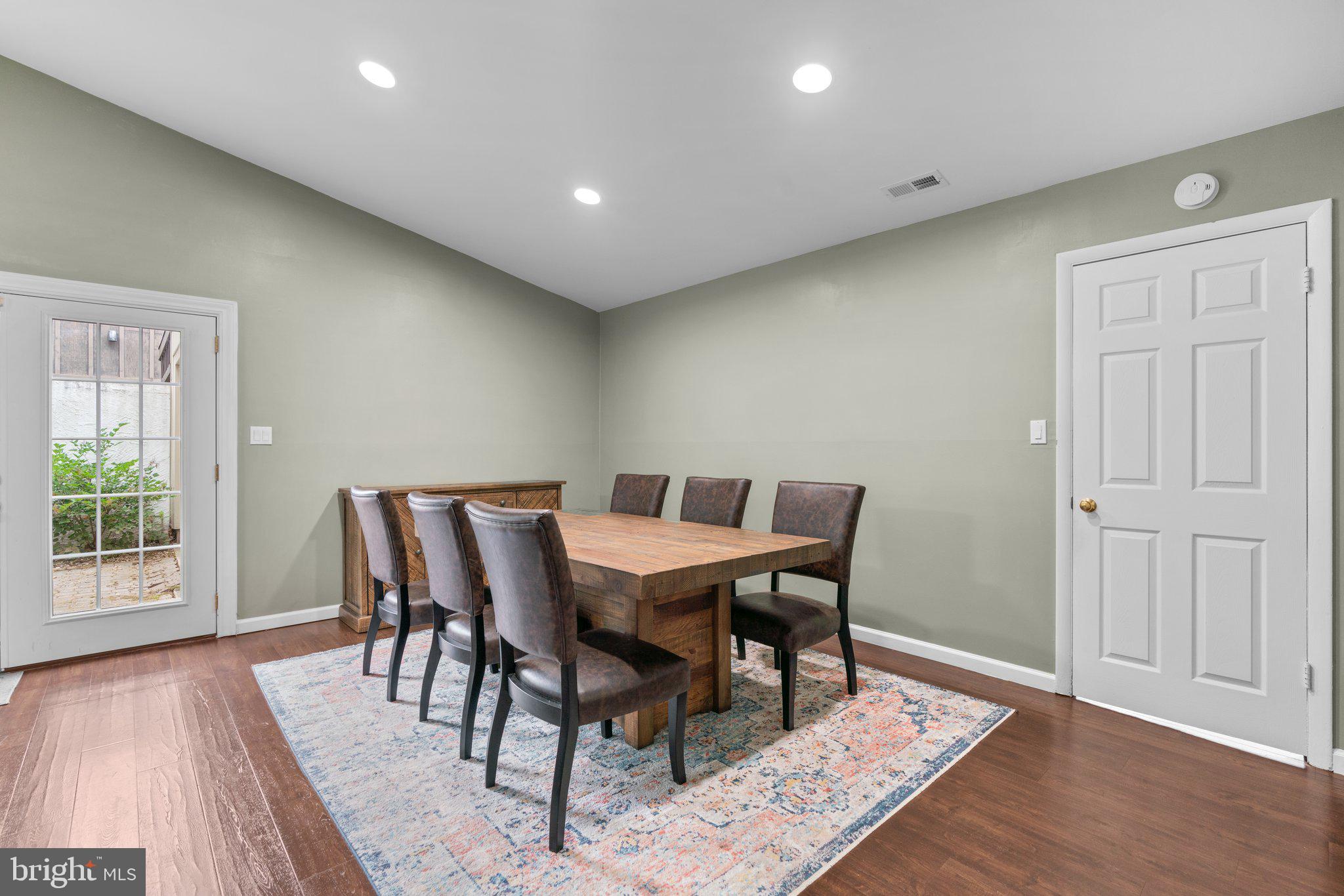 5367 Flight Feather Columbia, MD 21045 - Photo 11 of 42 a view of a dining room with furniture and wooden floor