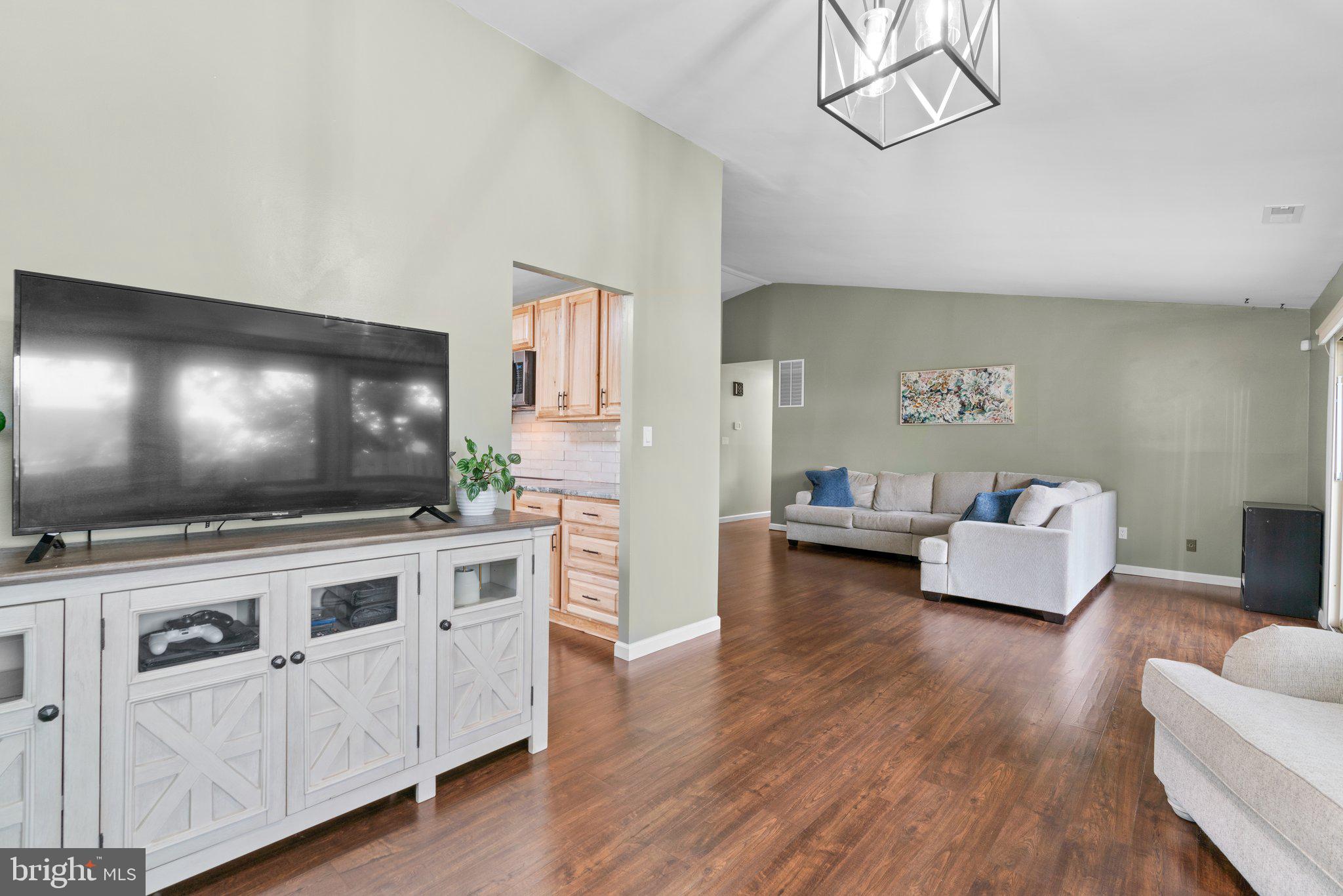 5367 Flight Feather Columbia, MD 21045 - Photo 42 of 42 a living room with furniture and a flat screen tv
