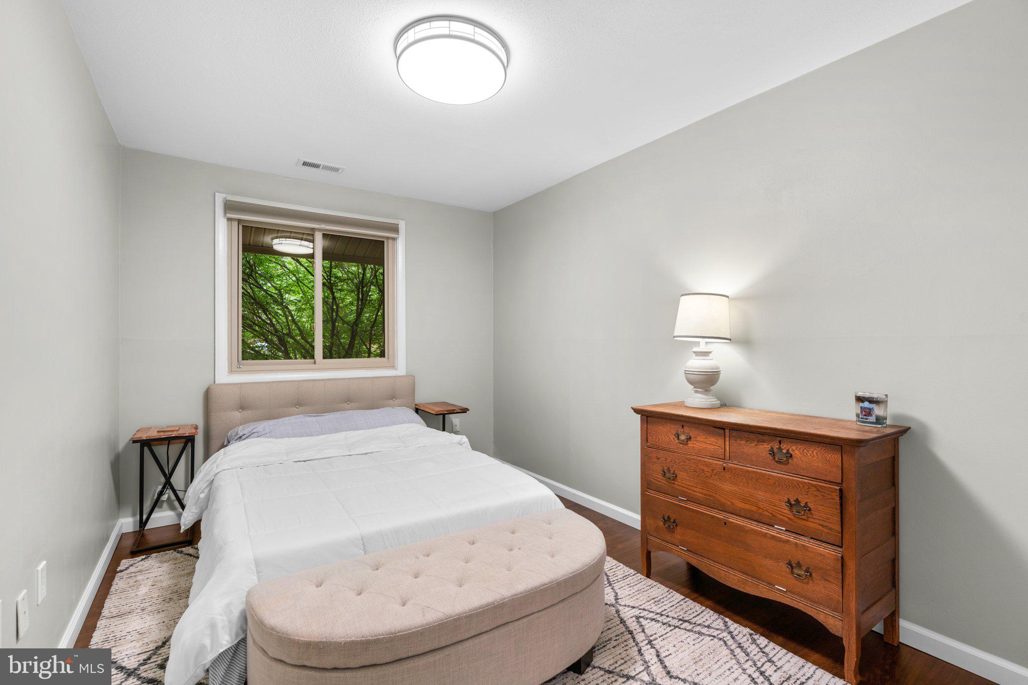 5367 Flight Feather Columbia, MD 21045 - Photo 25 of 42 a bedroom with a bed and a dresser