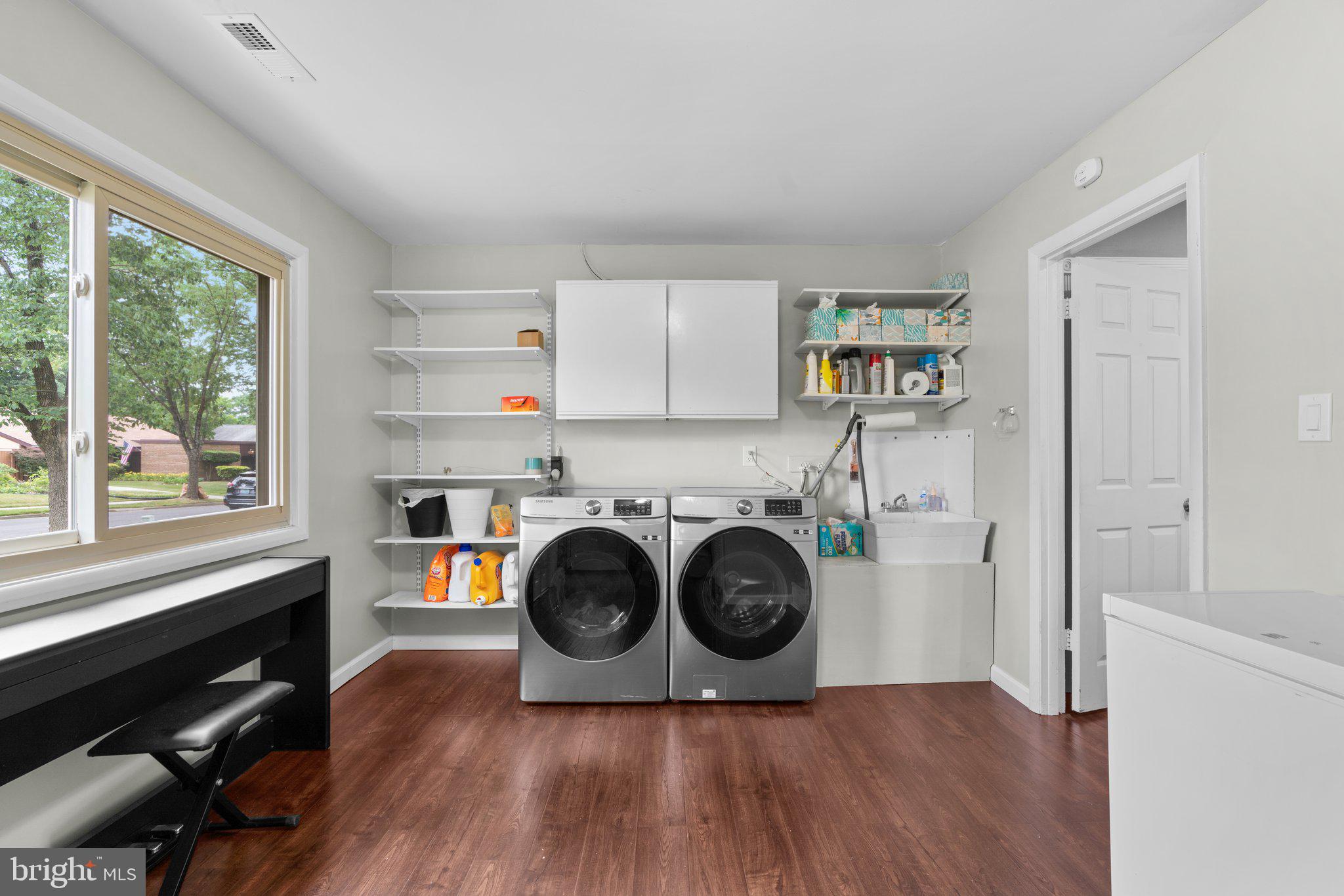 5367 Flight Feather Columbia, MD 21045 - Photo 30 of 42 a view of a kitchen with washer and dryer