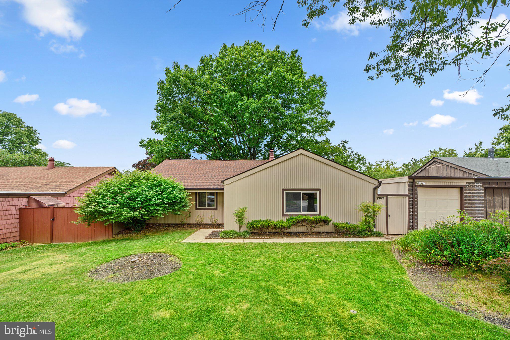 5367 Flight Feather Columbia, MD 21045 - Photo 41 of 42 a front view of a house with a garden