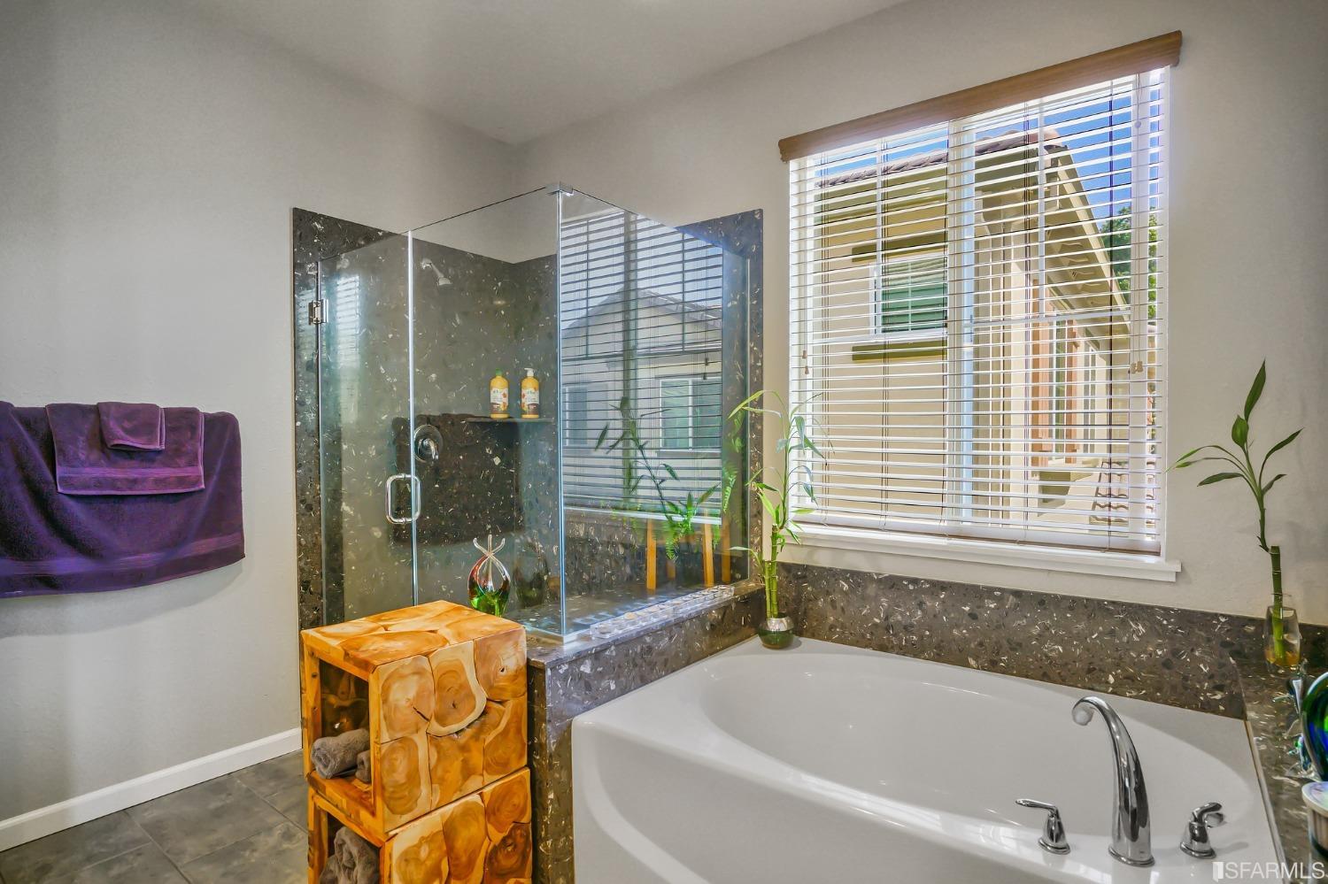 190 Belle Harbor Circle Pittsburg, CA 94565 - Photo 24 of 37 a bathroom with a tub a sink and a shower