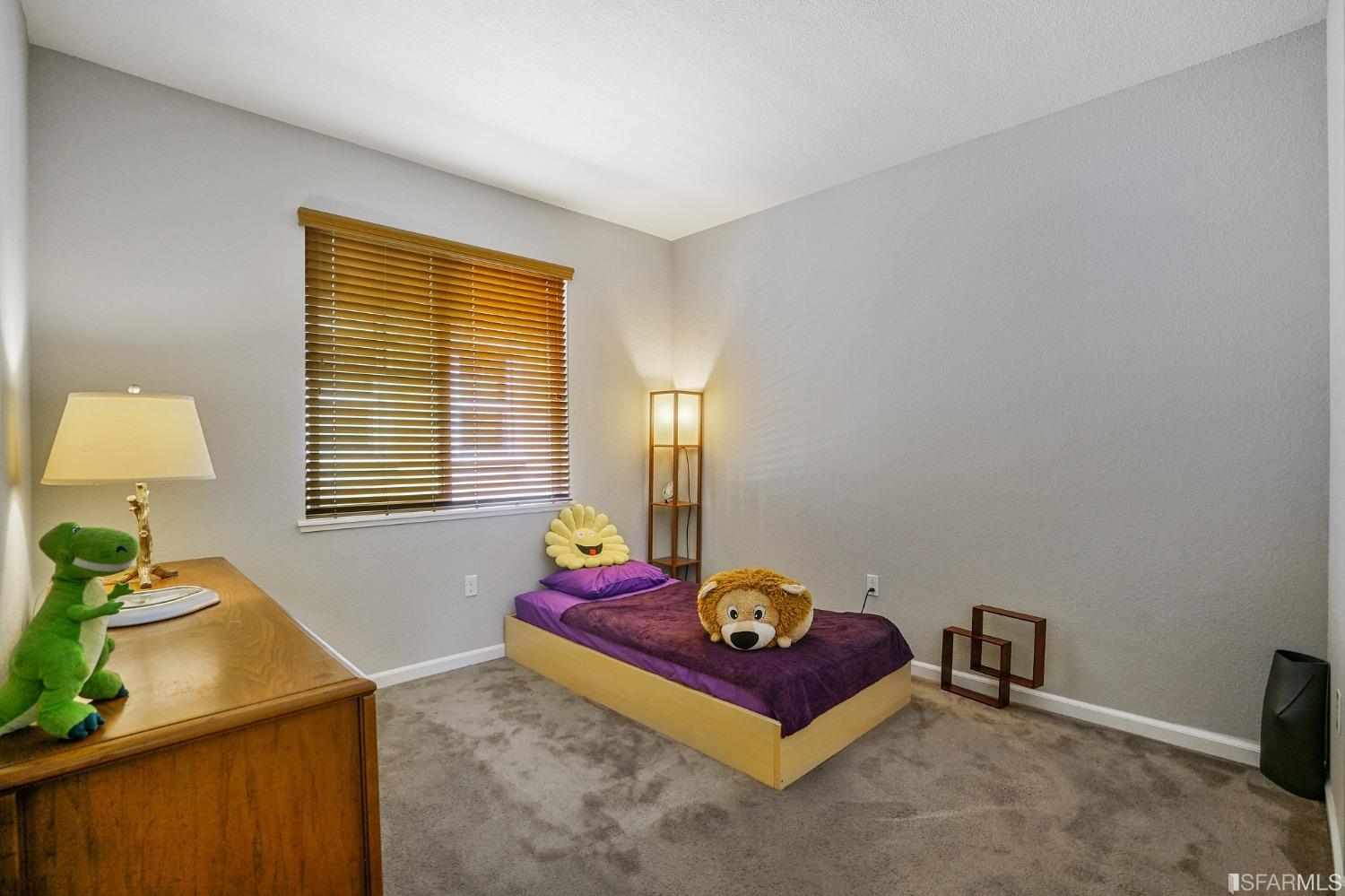 190 Belle Harbor Circle Pittsburg, CA 94565 - Photo 29 of 37 a bedroom with a bed and a window