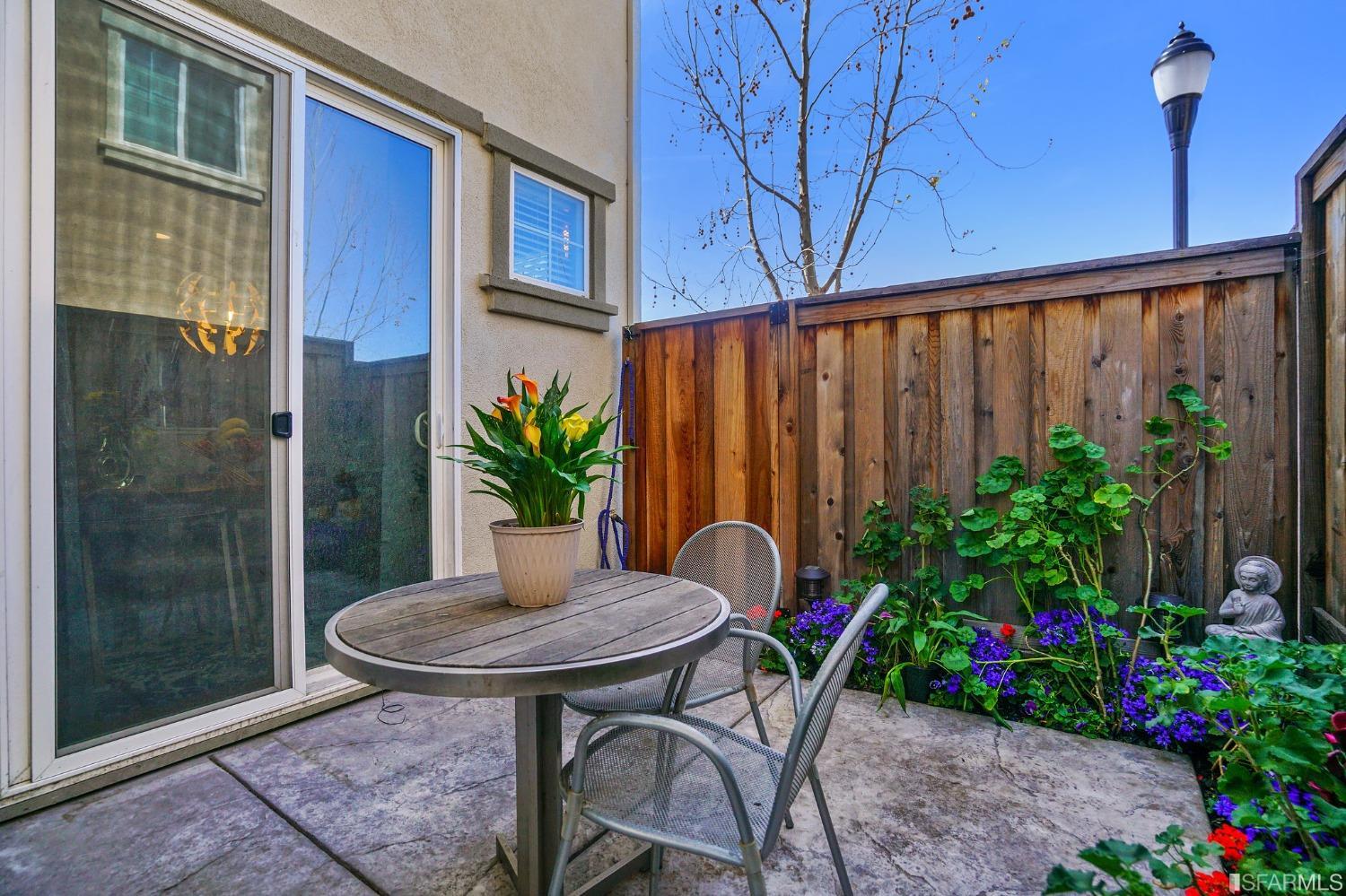190 Belle Harbor Circle Pittsburg, CA 94565 - Photo 34 of 37 a backyard of a house with table and chairs