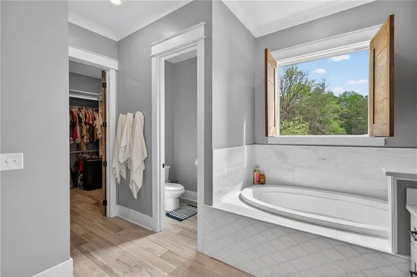 a view of a house with backyard and porch